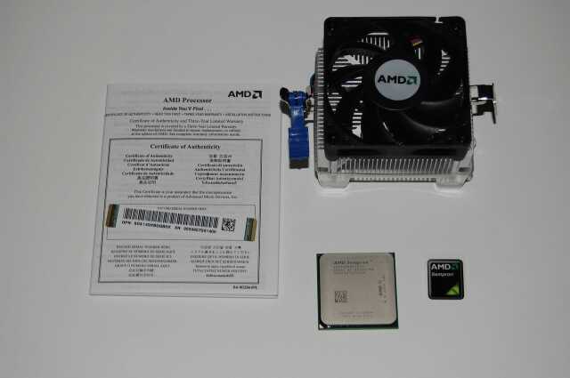 Фотография процессора AMD Sempron 140 с кулером и сертификатом